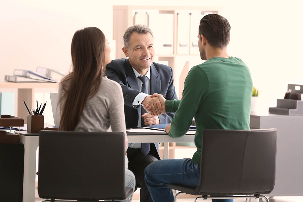 Young couple at notary public office