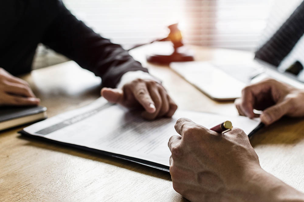 signing a document with a notary