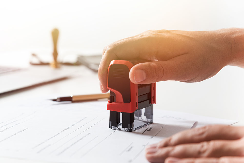 Lawyer, attorney working in office. Notary signs document. Law, legal concept.