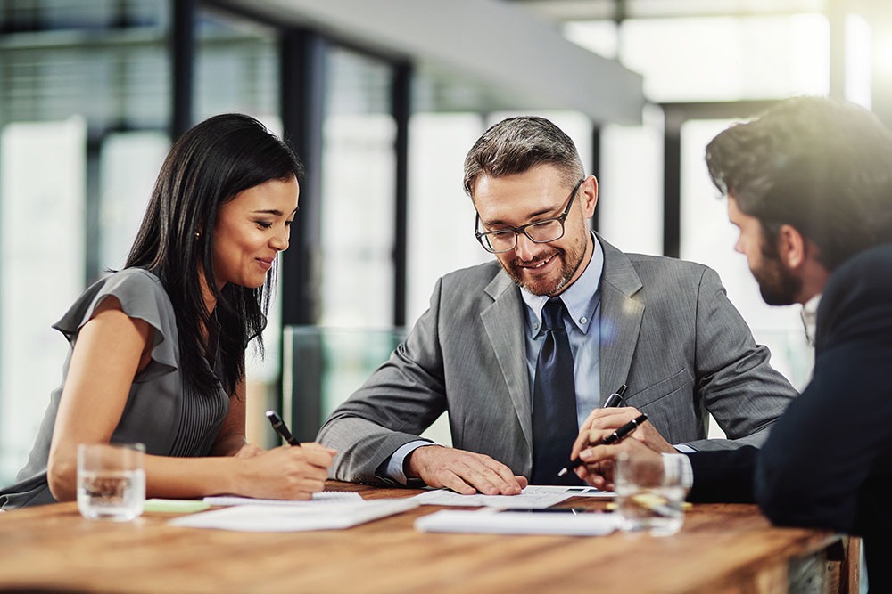 People, documents and business in office with collaboration, meeting and planning for company project. Financial analyst, corporate and papers with teamwork, strategy and agenda for investment deal.