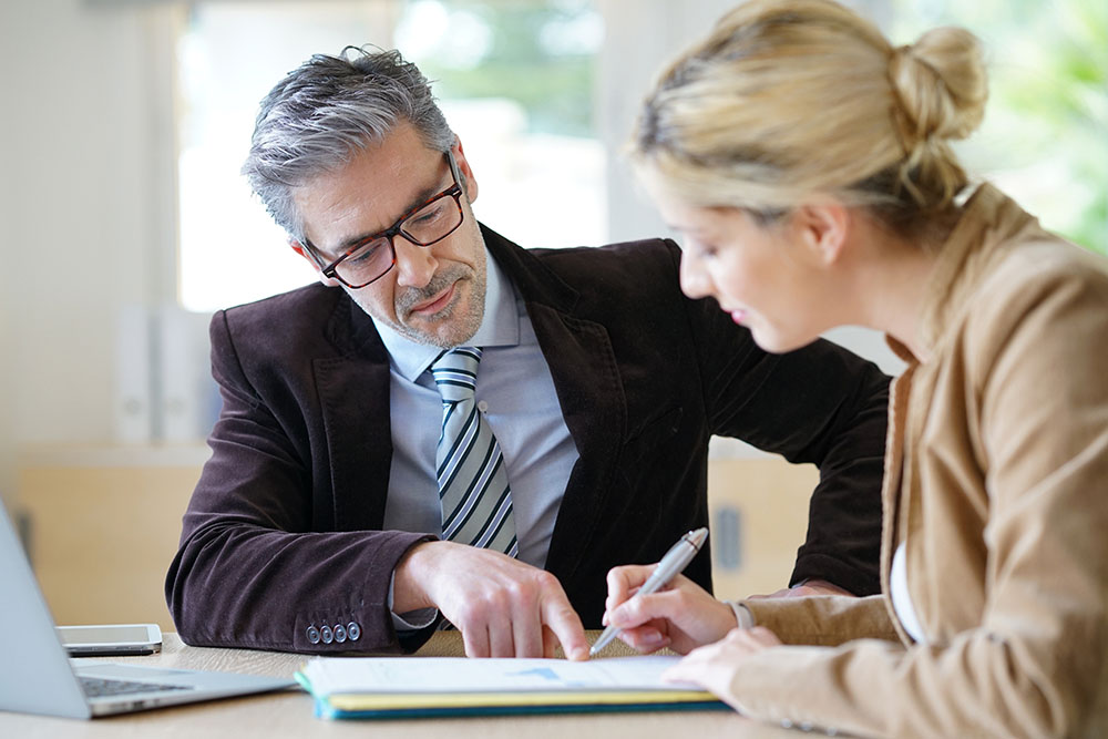 Woman meeting notary for advice