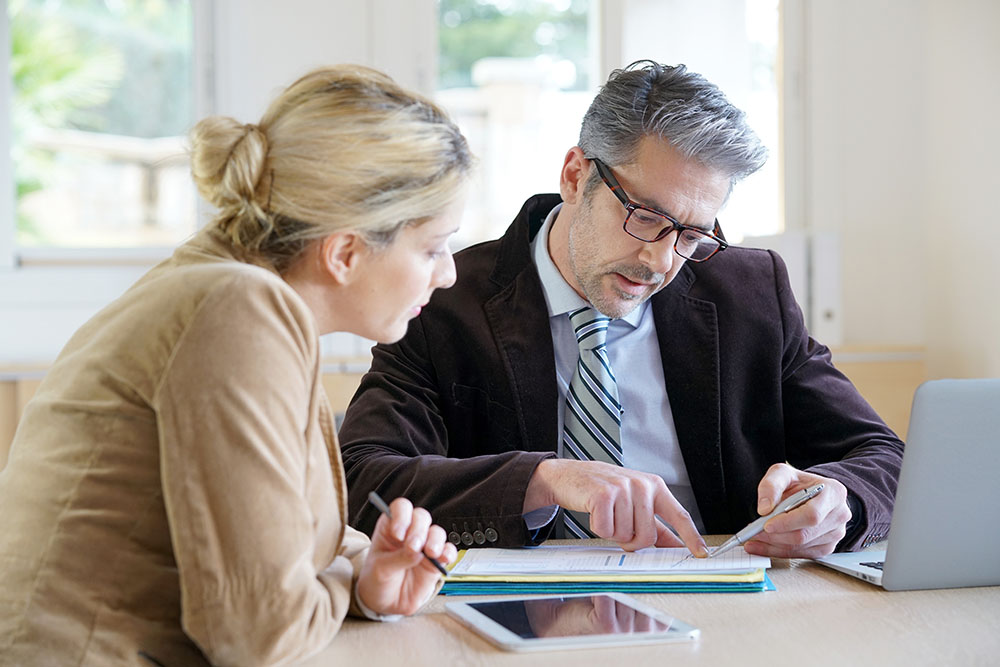 Woman meeting notary for advice