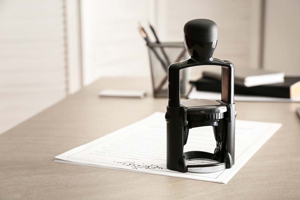 document and stamp on table of notary public