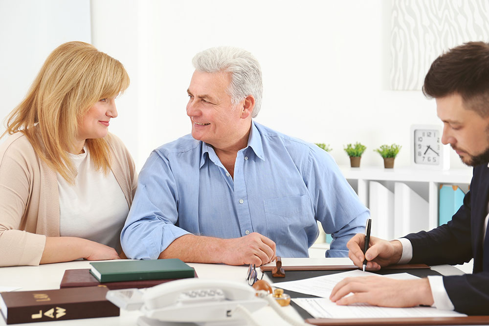 senior couple at notary public office