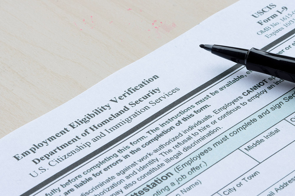 closeup of form i 9, employment eligibility verification, issued