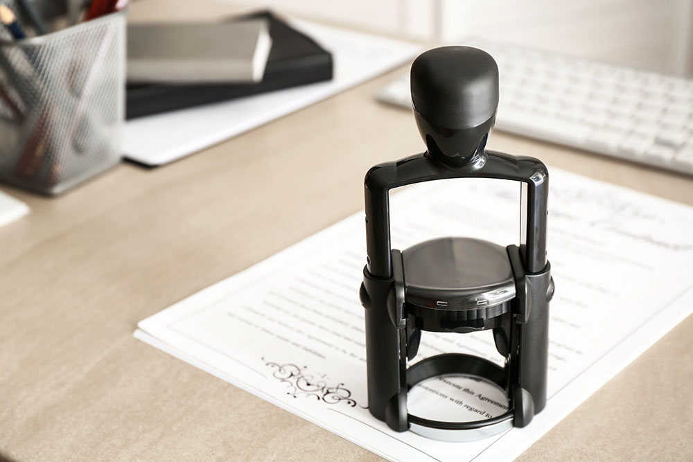 document and stamp on table of notary public