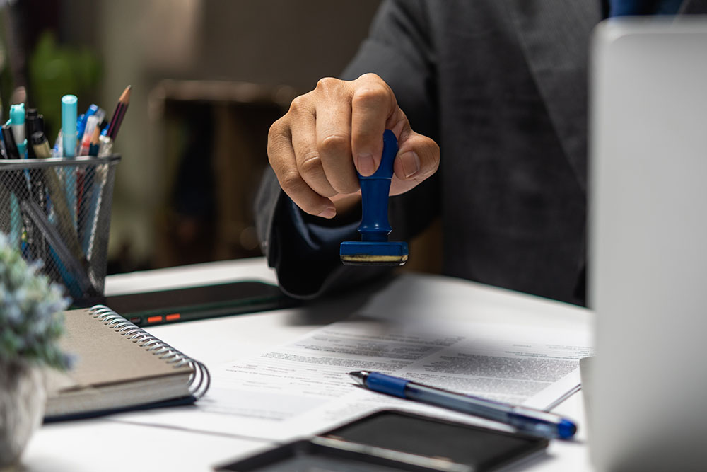 notary stamping a document