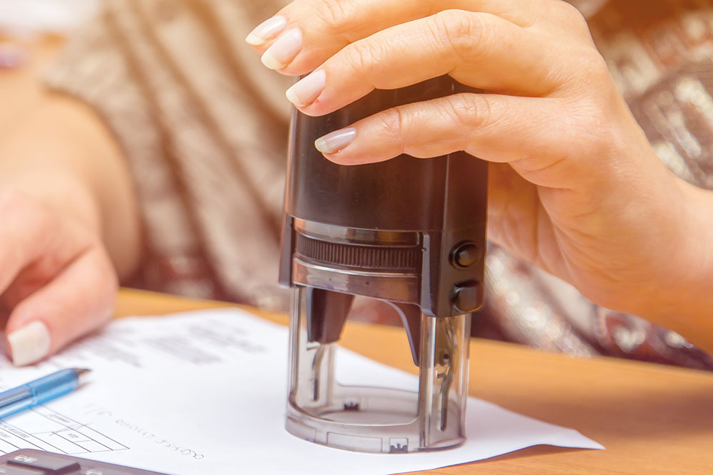 stamping documents closeup