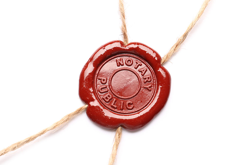 wax seal stamp of notary public on white background